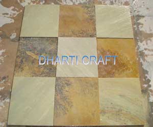 Mint color sandstone paving slabs with natural fossil on it